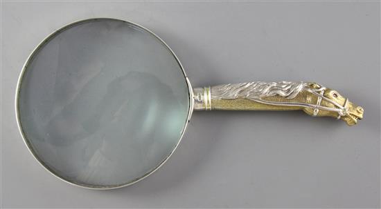 A modern parcel gilt silver mounted novelty magnifying glass, the handle modelled as the head and neck of a horse, 20.2cm
